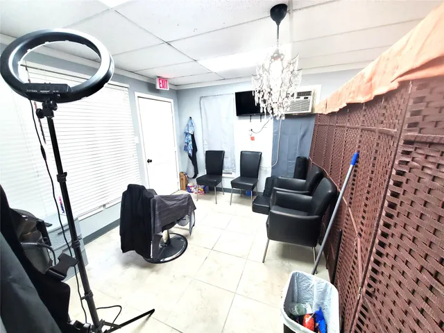 a view of livingroom with furniture and natural light