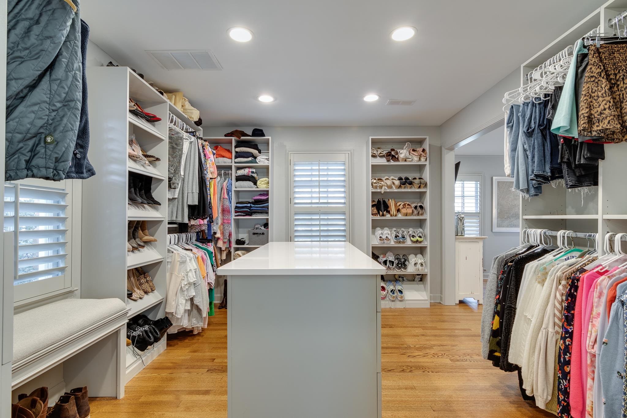 6417 Wood Bridge Road Memphis, TN 38119 - Photo 13 of 25 Lovely to look at, but also functional; impossible to have clutter in this closet. Pack your suitcase for a week away on the closet drawer island, but why leave?