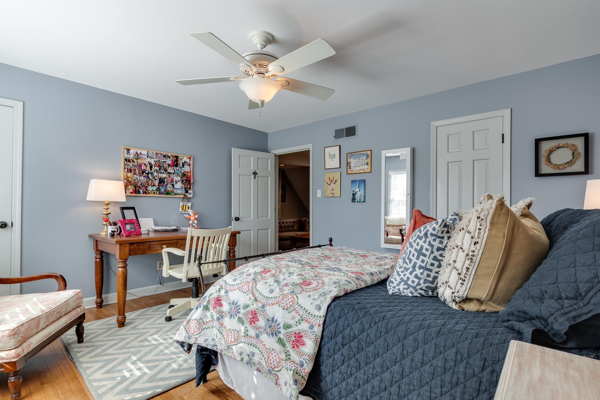 6417 Wood Bridge Road Memphis, TN 38119 - Photo 17 of 25 This bedroom has lots of nice light, 2 good sized closets and hardwood floors.