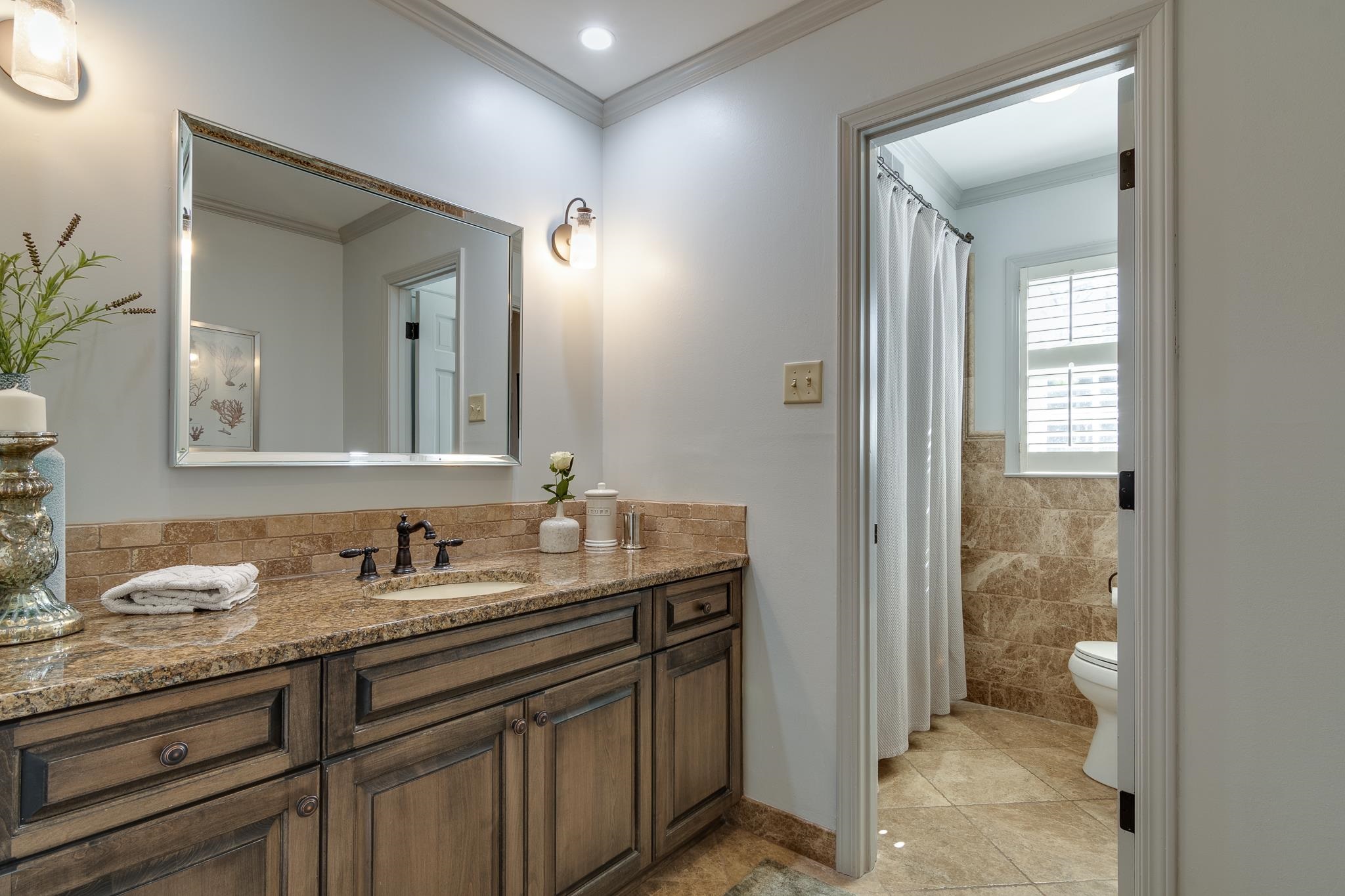 6417 Wood Bridge Road Memphis, TN 38119 - Photo 23 of 25 Prettiest powder room ever, complete with extra shower/tub combo.