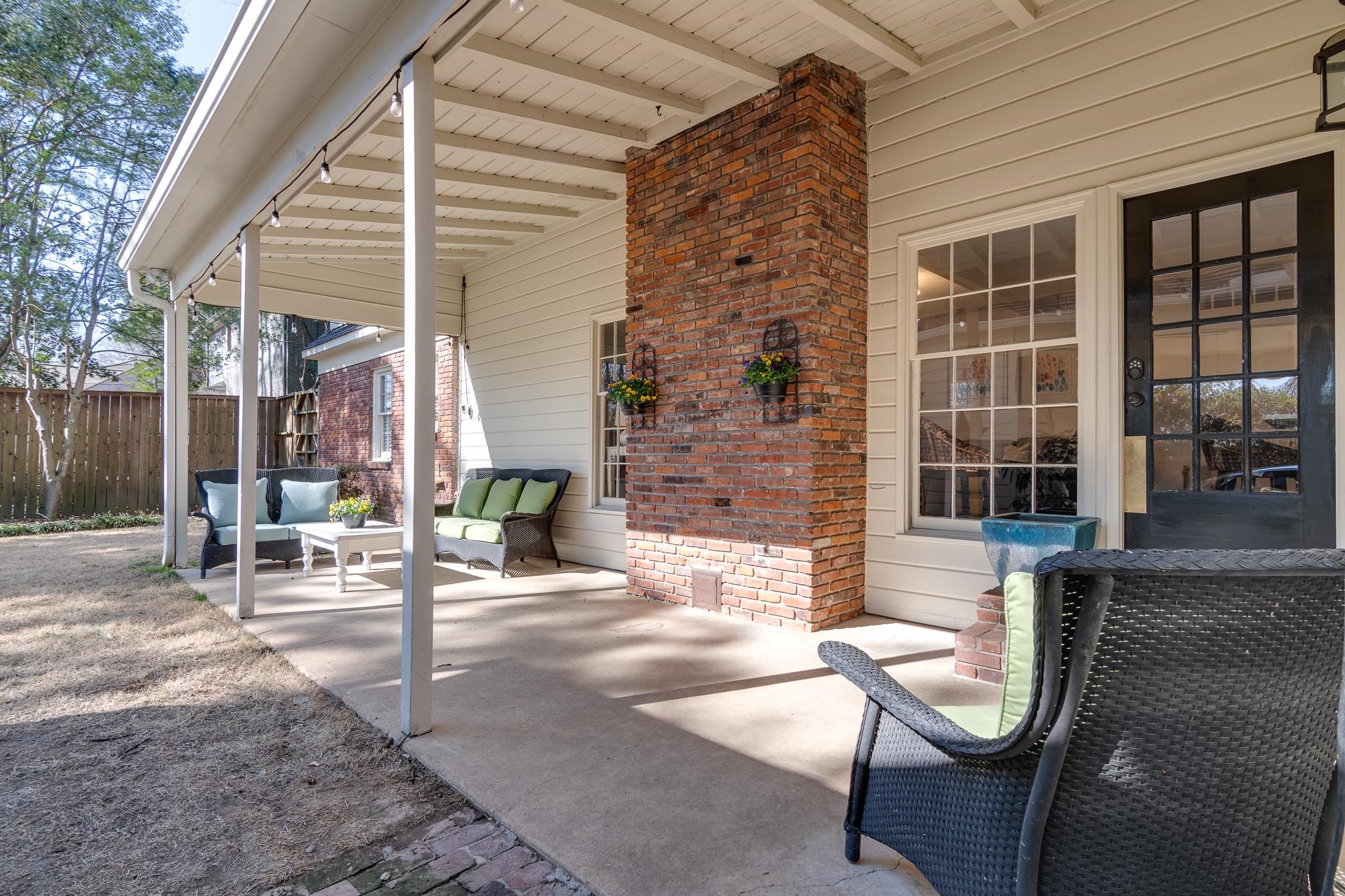 6417 Wood Bridge Road Memphis, TN 38119 - Photo 24 of 25 Covered patio just off the den and kitchen makes grilling out and entertaining super easy! Plenty of privacy with the fenced back yard also.