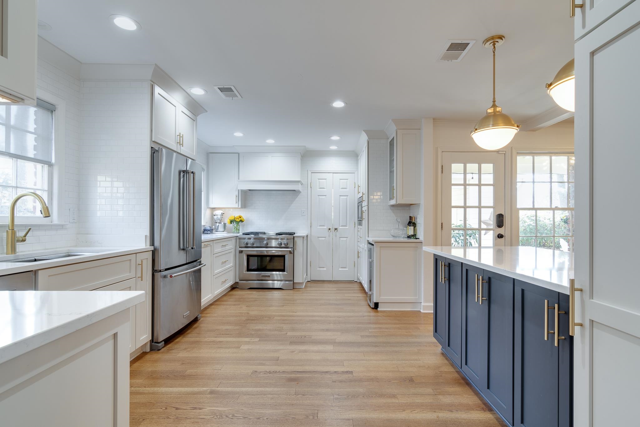 6417 Wood Bridge Road Memphis, TN 38119 - Photo 5 of 25 The amount counter space in this kitchen is amazing! The hardware and pendant lighting in Champagne Bronze is the perfect hint of elegance.