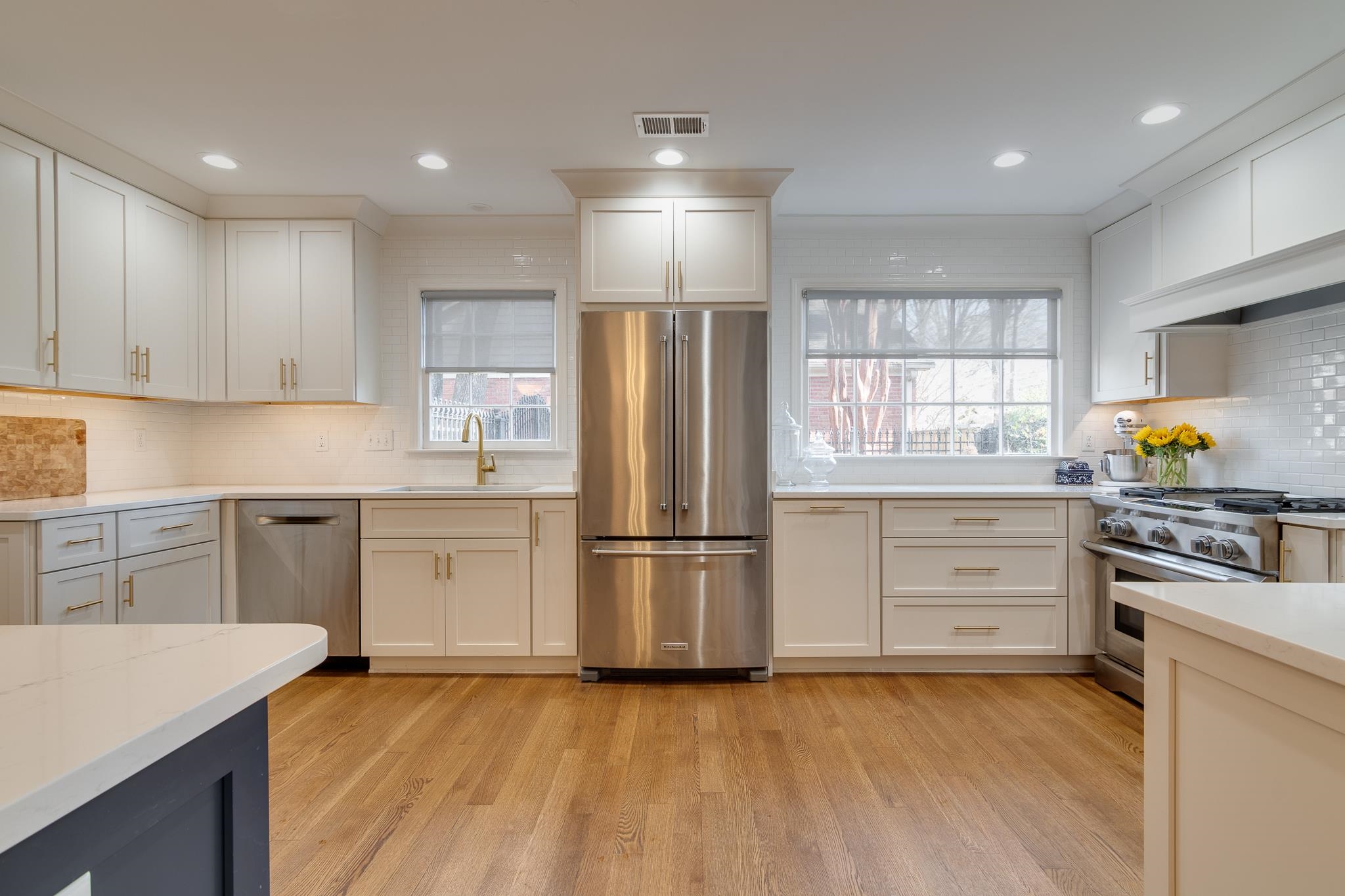 6417 Wood Bridge Road Memphis, TN 38119 - Photo 7 of 25 The range is correctly placed for removing hot items from the oven for cooling; the refrigerator is a breeze to load with all the quartz countertop space. The light from the windows with the shades, just in case.