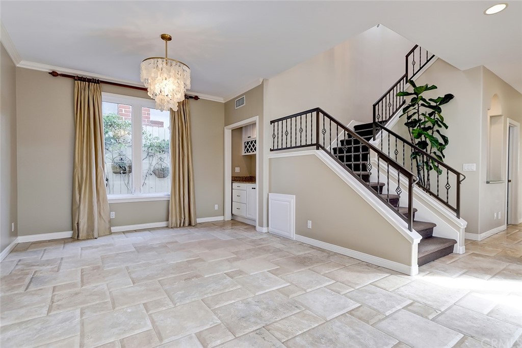 717 29th Street Manhattan Beach, CA 90266 - Photo 13 of 47 Stone floors and unique dining room chandelier