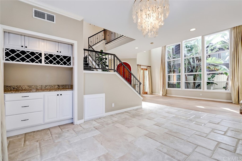 717 29th Street Manhattan Beach, CA 90266 - Photo 14 of 47 Formal dining room with built-in cabinets and wine display