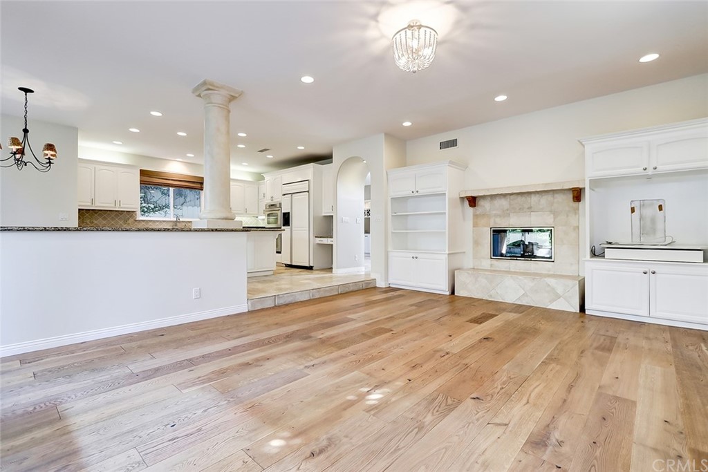 717 29th Street Manhattan Beach, CA 90266 - Photo 16 of 47 Family room see through fireplace and built-in cabinets