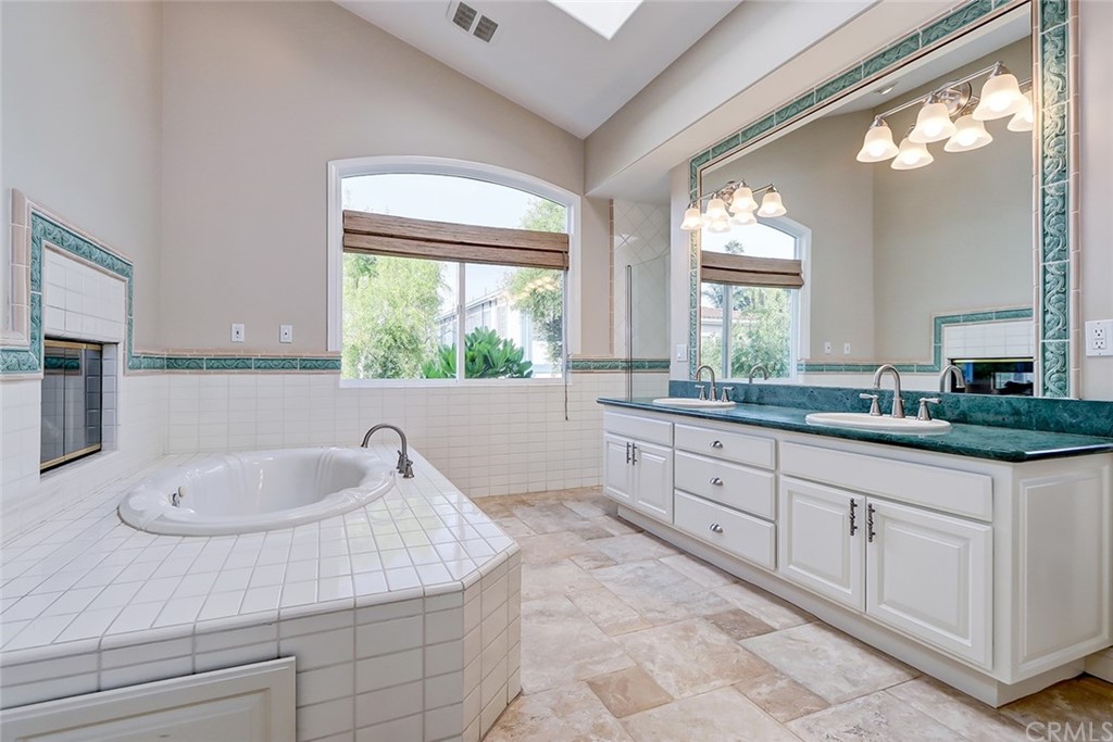 717 29th Street Manhattan Beach, CA 90266 - Photo 28 of 47 Large master bathroom with stone floors