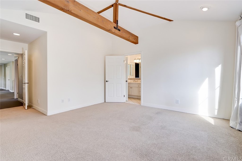 717 29th Street Manhattan Beach, CA 90266 - Photo 35 of 47 Vaulted beamed ceiling with recessed lighting