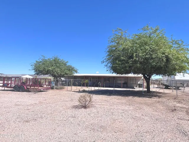 a view of swimming pool with a yard