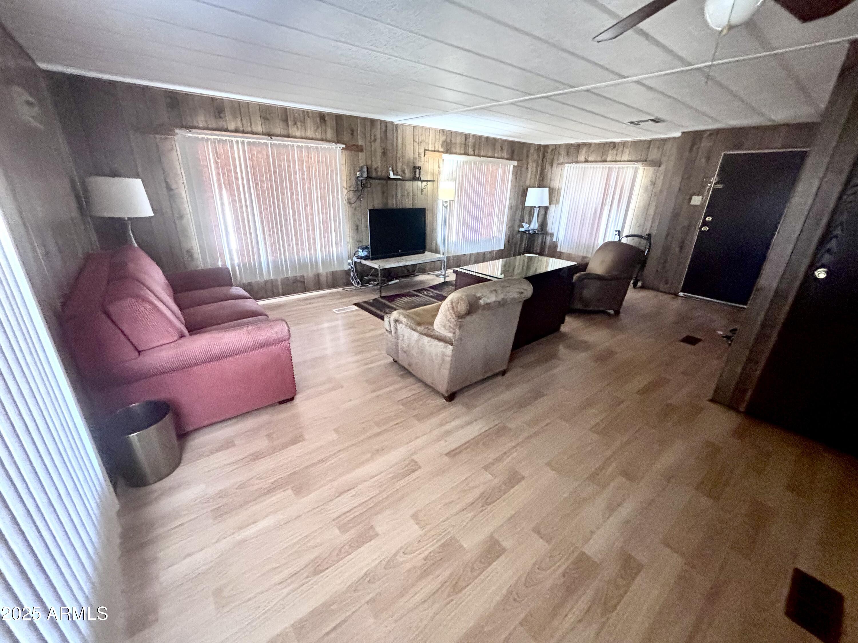 1221 West Nelson Road Ajo, AZ 85321 - Photo 7 of 17 a living room with furniture and a flat screen tv