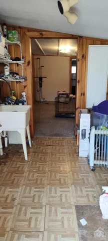 a living room with lots of furniture and a rug