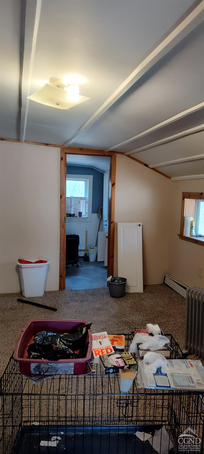 436-450 Scutt Road Greenville, NY 12083 - Photo 6 of 22 a bedroom with furniture and a lamp