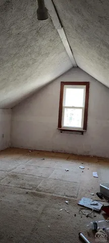 a view of a room with a window