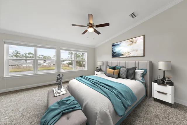 a bedroom with bed and window