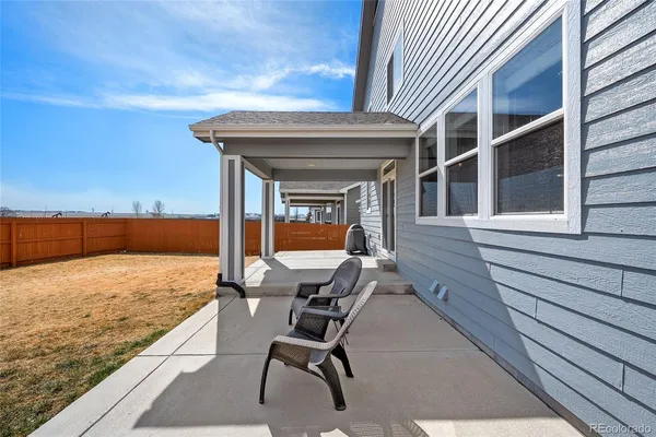 a view of a lounge chair in the balcony