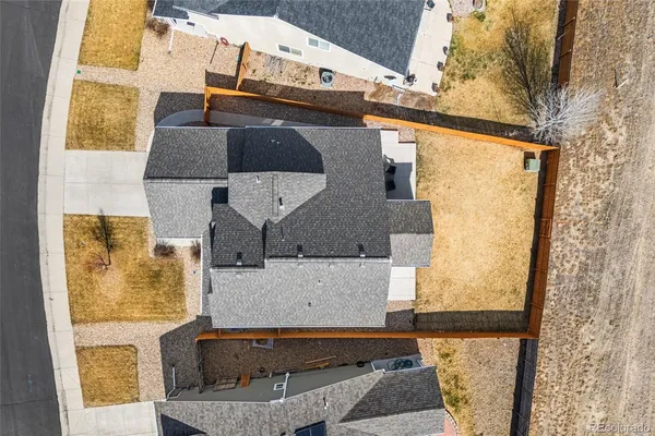 an aerial view of a city with lots of residential buildings