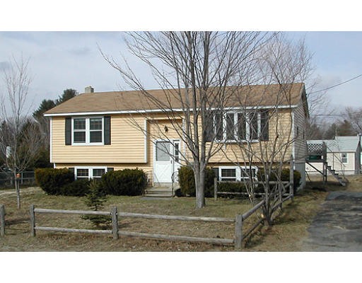 18 Plainfield Road Pepperell, MA 01463 - Photo 1 of 1 a view of a yard in front of a house