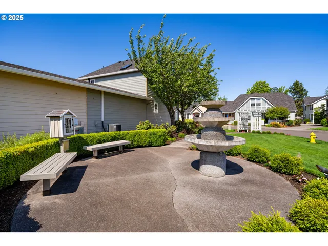 a garden view with a seating space