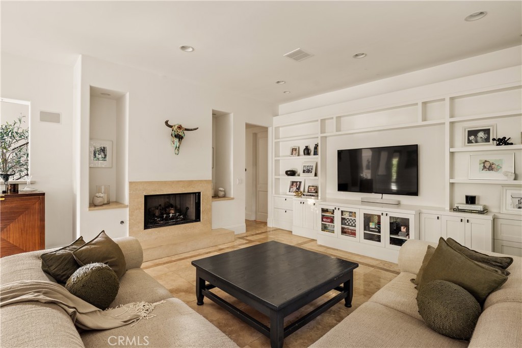4210 Old Topanga Canyon Road Calabasas, CA 91302 - Photo 13 of 40 a living room with furniture and a flat screen tv