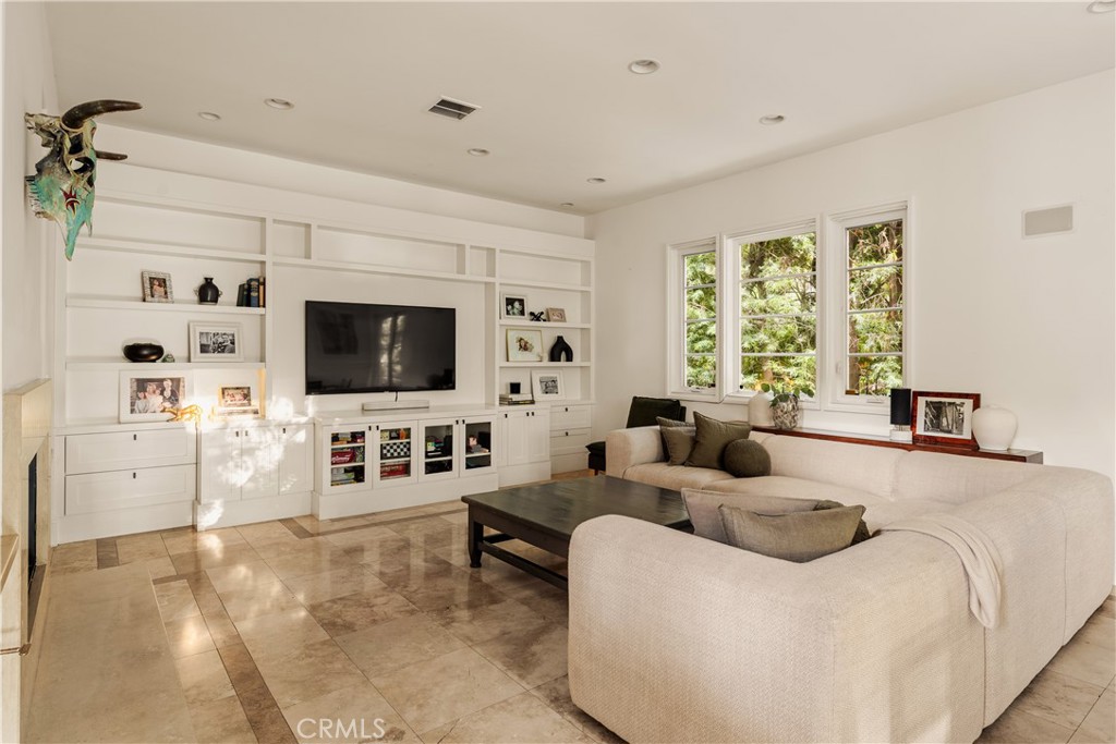4210 Old Topanga Canyon Road Calabasas, CA 91302 - Photo 14 of 40 a living room with furniture and a flat screen tv