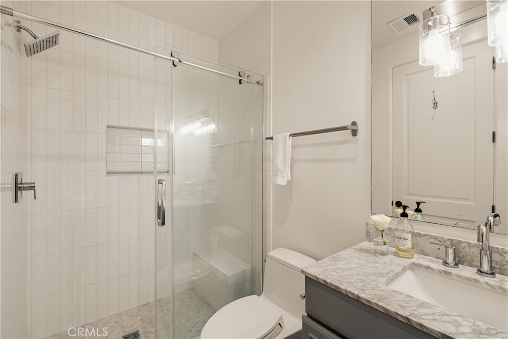 4210 Old Topanga Canyon Road Calabasas, CA 91302 - Photo 19 of 40 a bathroom with a granite countertop sink toilet and shower