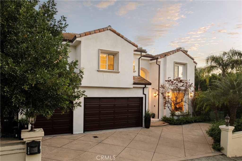 4210 Old Topanga Canyon Road Calabasas, CA 91302 - Photo 2 of 40 a front view of a house with garden