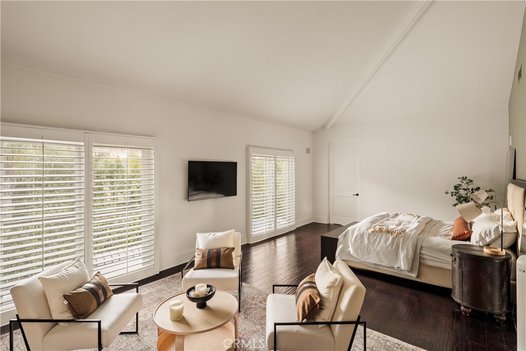 4210 Old Topanga Canyon Road Calabasas, CA 91302 - Photo 23 of 40 a bedroom with a bed and a chair