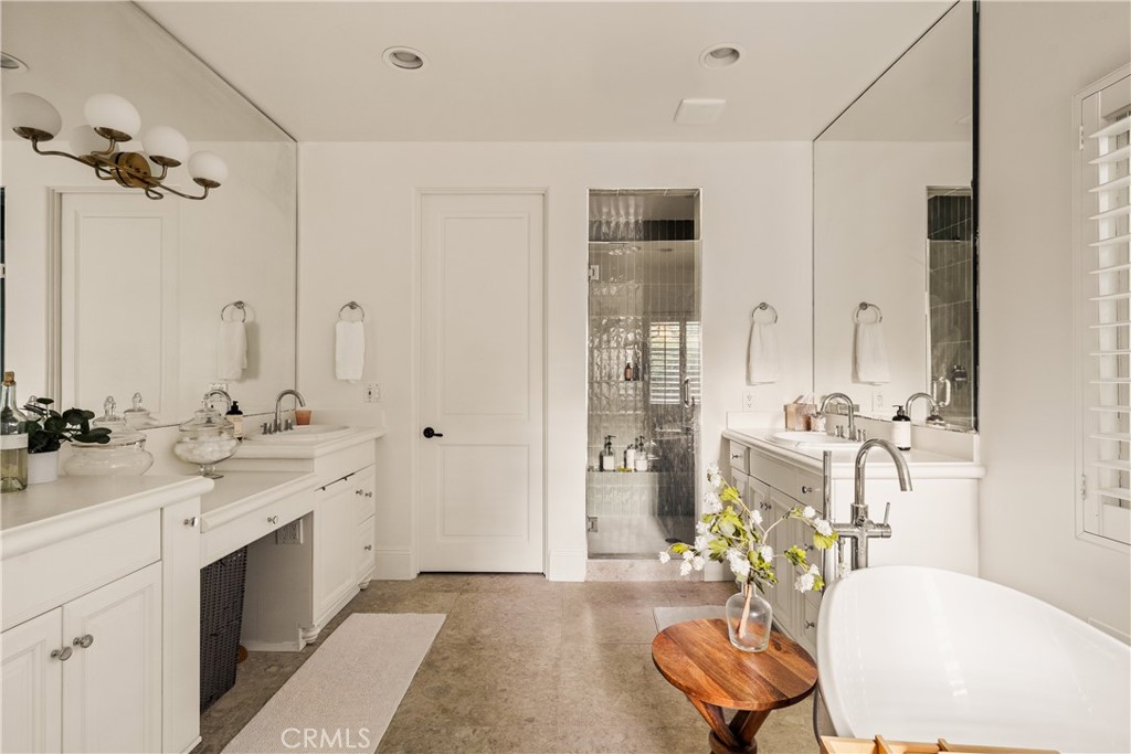 4210 Old Topanga Canyon Road Calabasas, CA 91302 - Photo 26 of 40 a spacious bathroom with a granite countertop sink mirror and bathtub