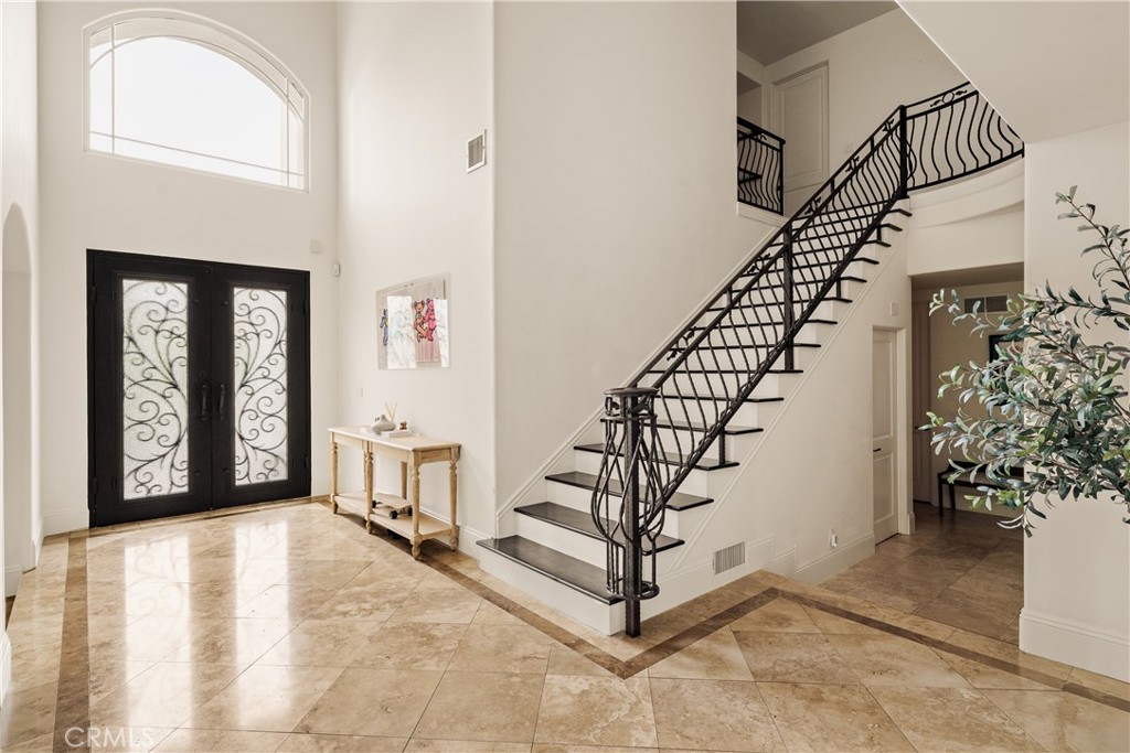 4210 Old Topanga Canyon Road Calabasas, CA 91302 - Photo 3 of 40 a view of entryway with stairs and wooden floor