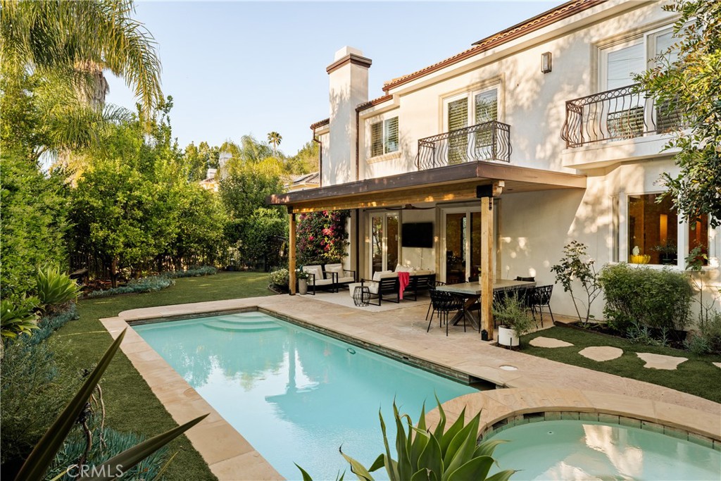 4210 Old Topanga Canyon Road Calabasas, CA 91302 - Photo 31 of 40 a view of a house with swimming pool and sitting area