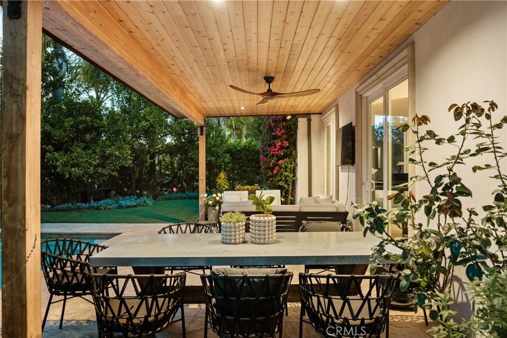 4210 Old Topanga Canyon Road Calabasas, CA 91302 - Photo 36 of 40 a view of an outside dining space with furniture window