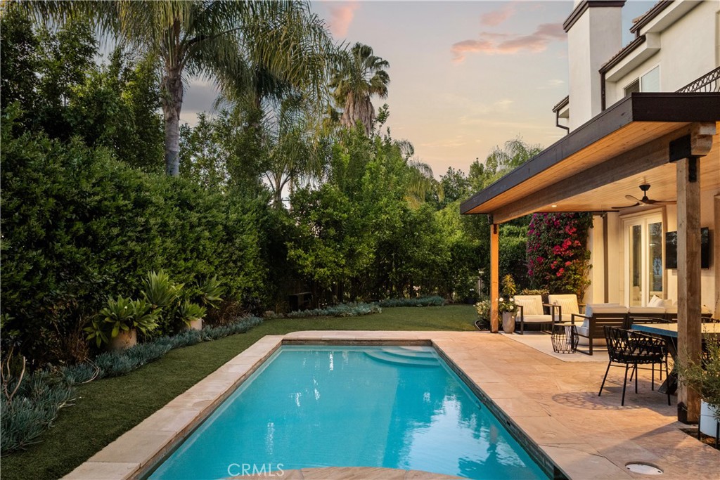 4210 Old Topanga Canyon Road Calabasas, CA 91302 - Photo 37 of 40 a view of a patio with swimming pool table and chairs