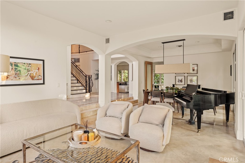 4210 Old Topanga Canyon Road Calabasas, CA 91302 - Photo 5 of 40 a living room with furniture a dining table and a piano table