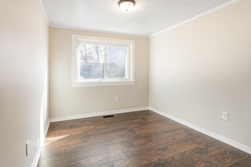 57 West Shore Road Holbrook, MA 02343 - Photo 11 of 13 an empty room with a window