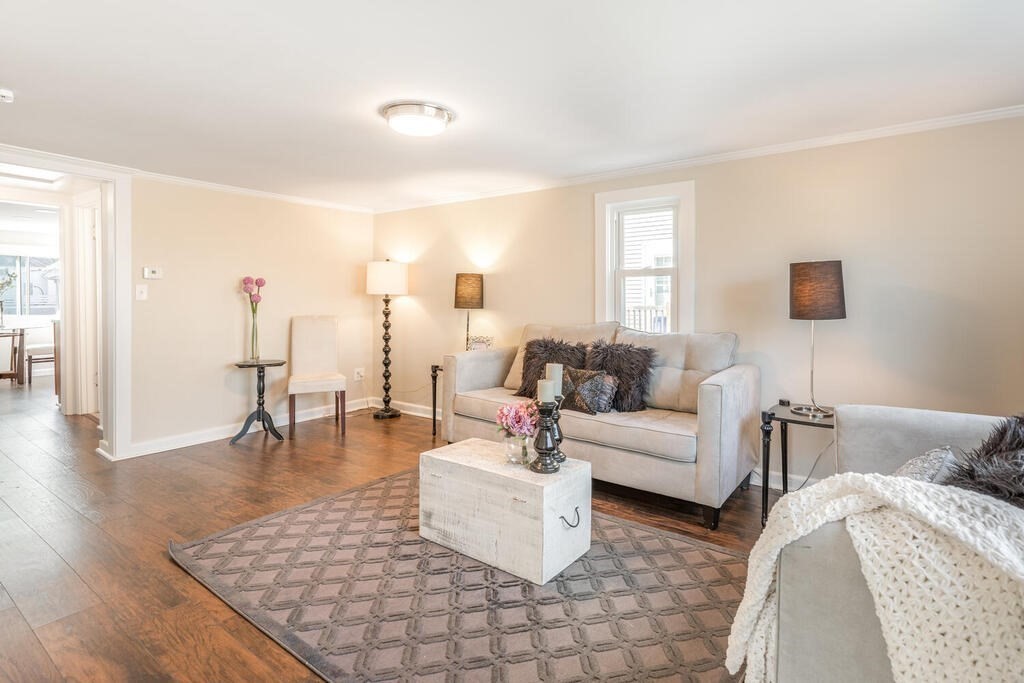 57 West Shore Road Holbrook, MA 02343 - Photo 3 of 13 a living room with furniture and wooden floor