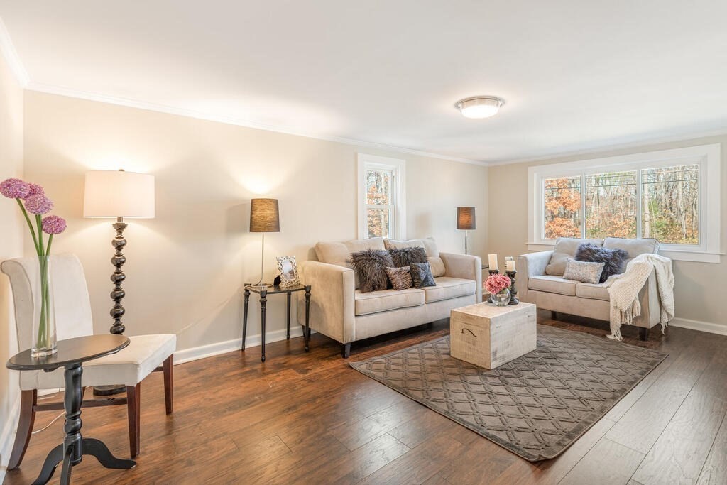 57 West Shore Road Holbrook, MA 02343 - Photo 4 of 13 a living room with furniture and wooden floor