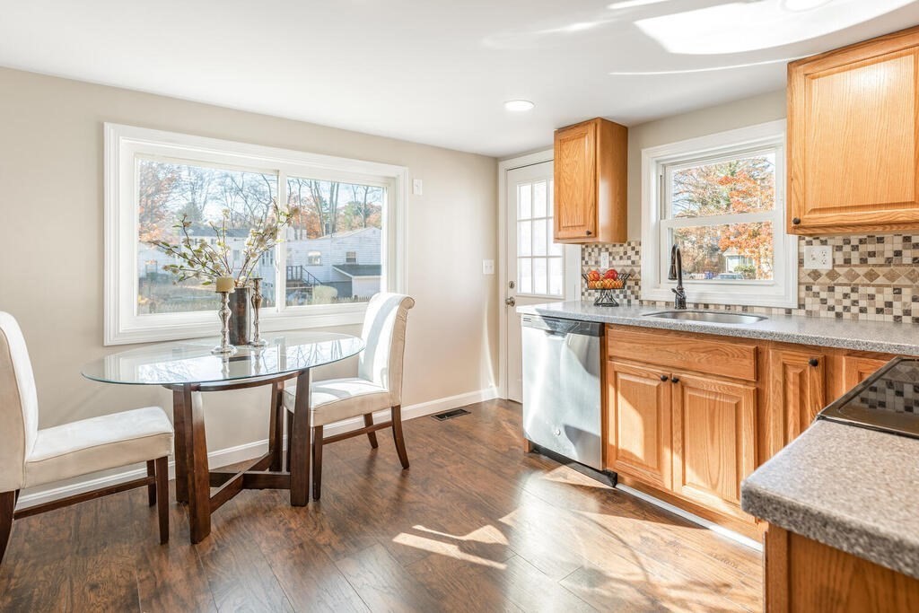 57 West Shore Road Holbrook, MA 02343 - Photo 5 of 13 a view of a dining room with furniture window and outside view