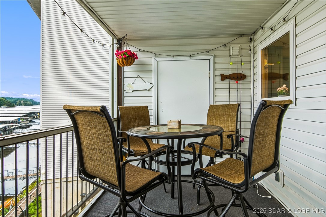 40 Lighthouse Road, Unit 3104 Lake Ozark, MO 65049 - Photo 6 of 33 The screened in porch is the perfect place to enjo