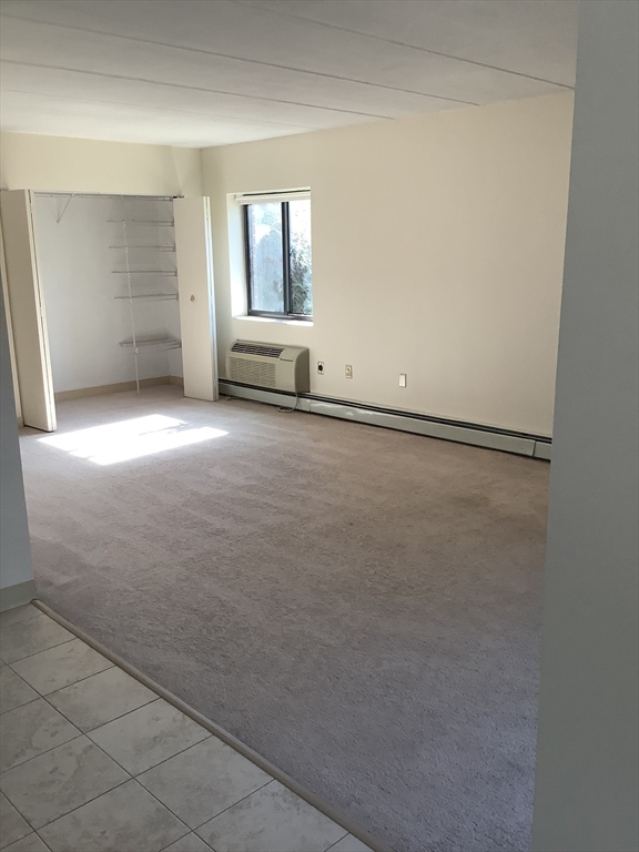 50 Cambridge Road, Unit 302 Woburn, MA 01801 - Photo 3 of 7