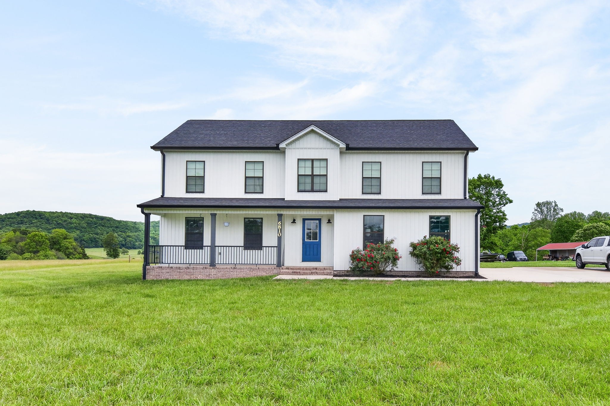 6810 Cherry Creek Road Cookeville, TN 38506 - Photo 1 of 35 a front view of house with yard and green space