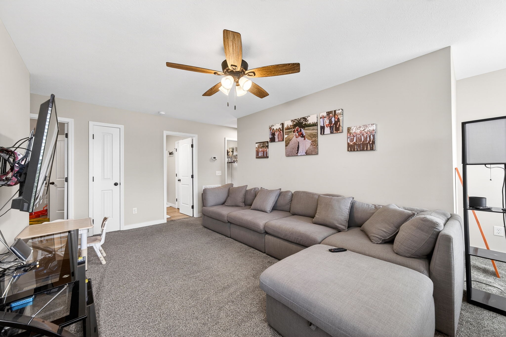 6810 Cherry Creek Road Cookeville, TN 38506 - Photo 13 of 35 a living room with furniture and a flat screen tv