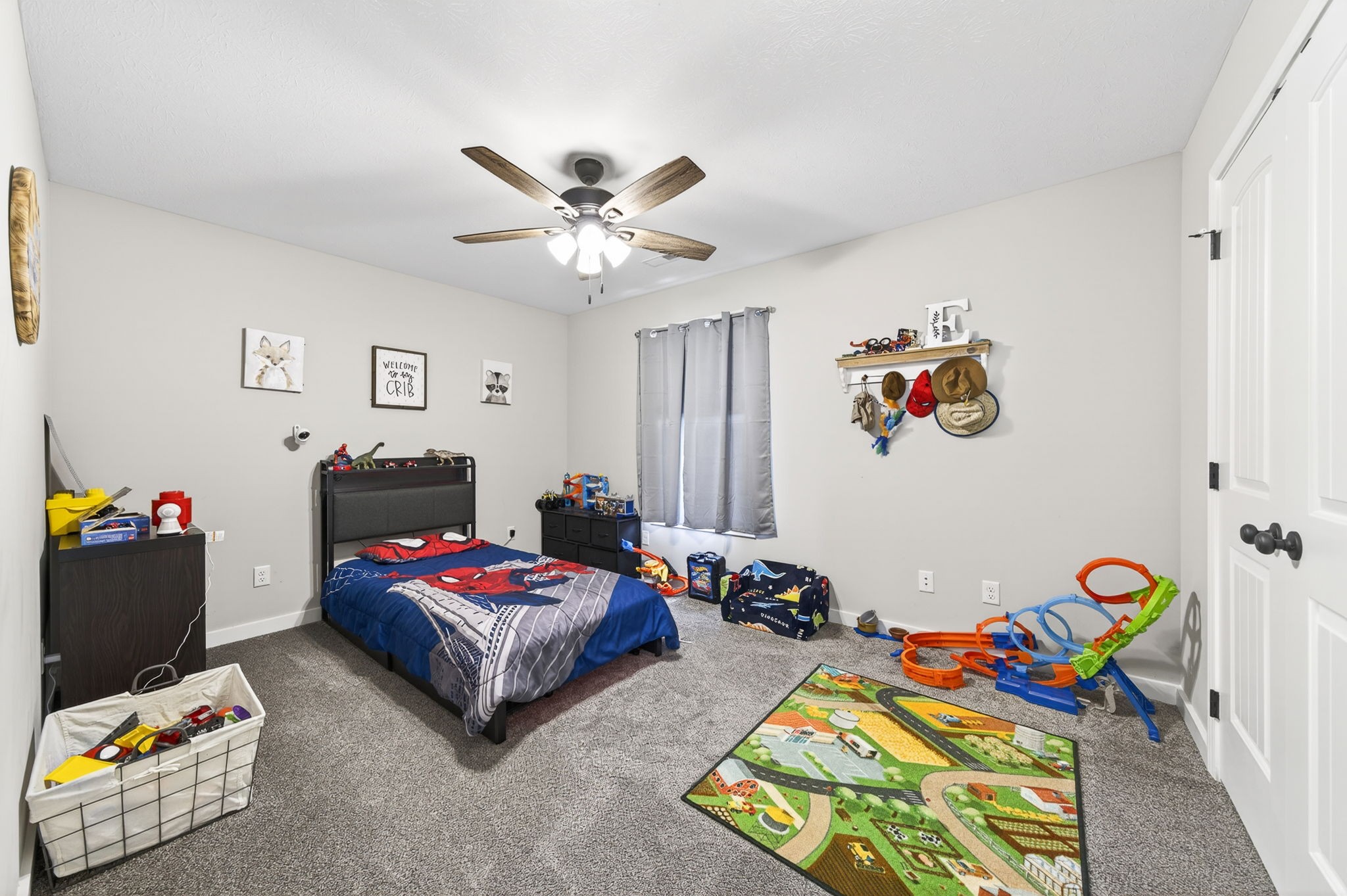 6810 Cherry Creek Road Cookeville, TN 38506 - Photo 16 of 35 a bedroom with a bed and a chandelier