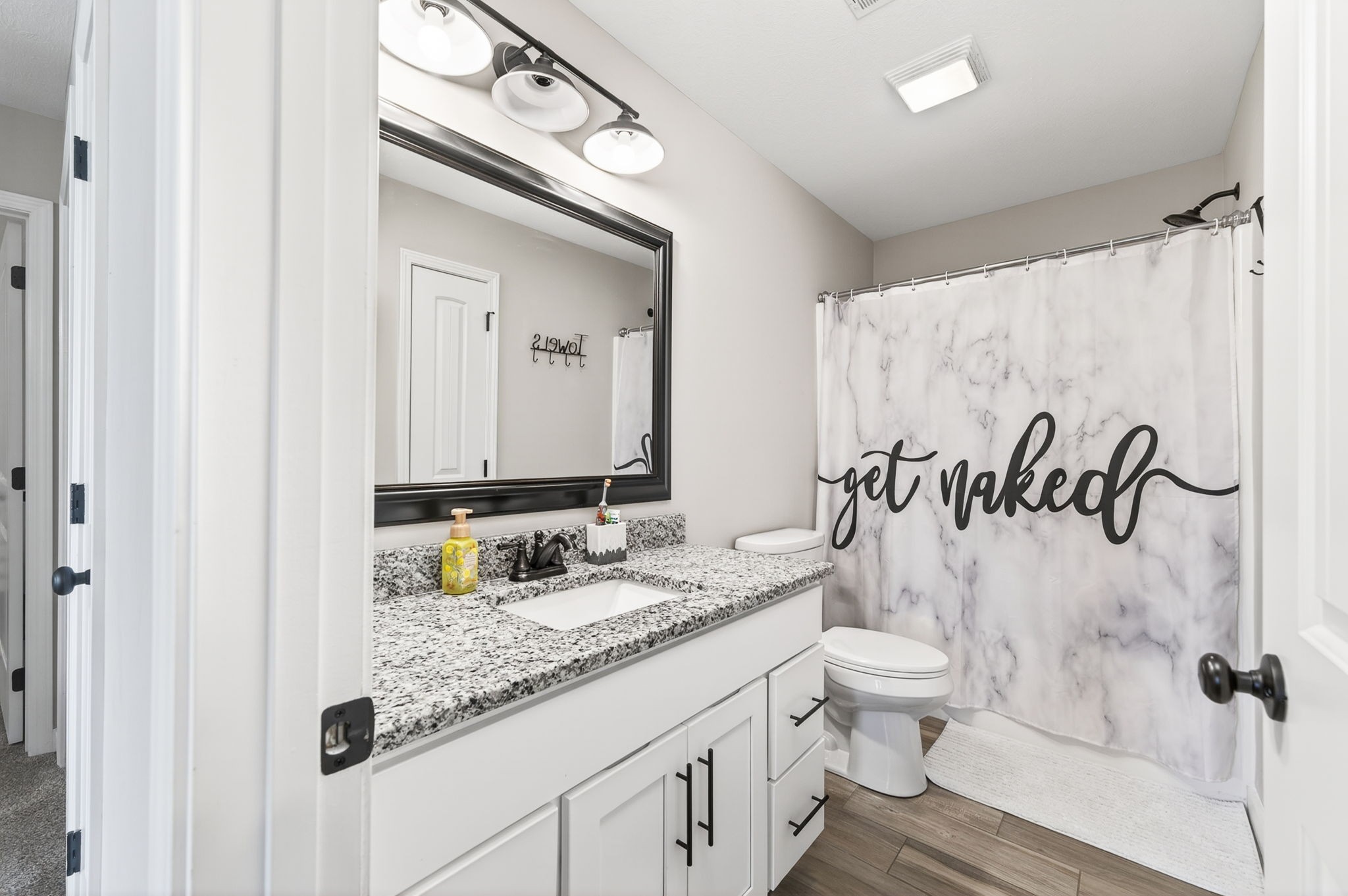 6810 Cherry Creek Road Cookeville, TN 38506 - Photo 20 of 35 a bathroom with a granite countertop sink and a mirror