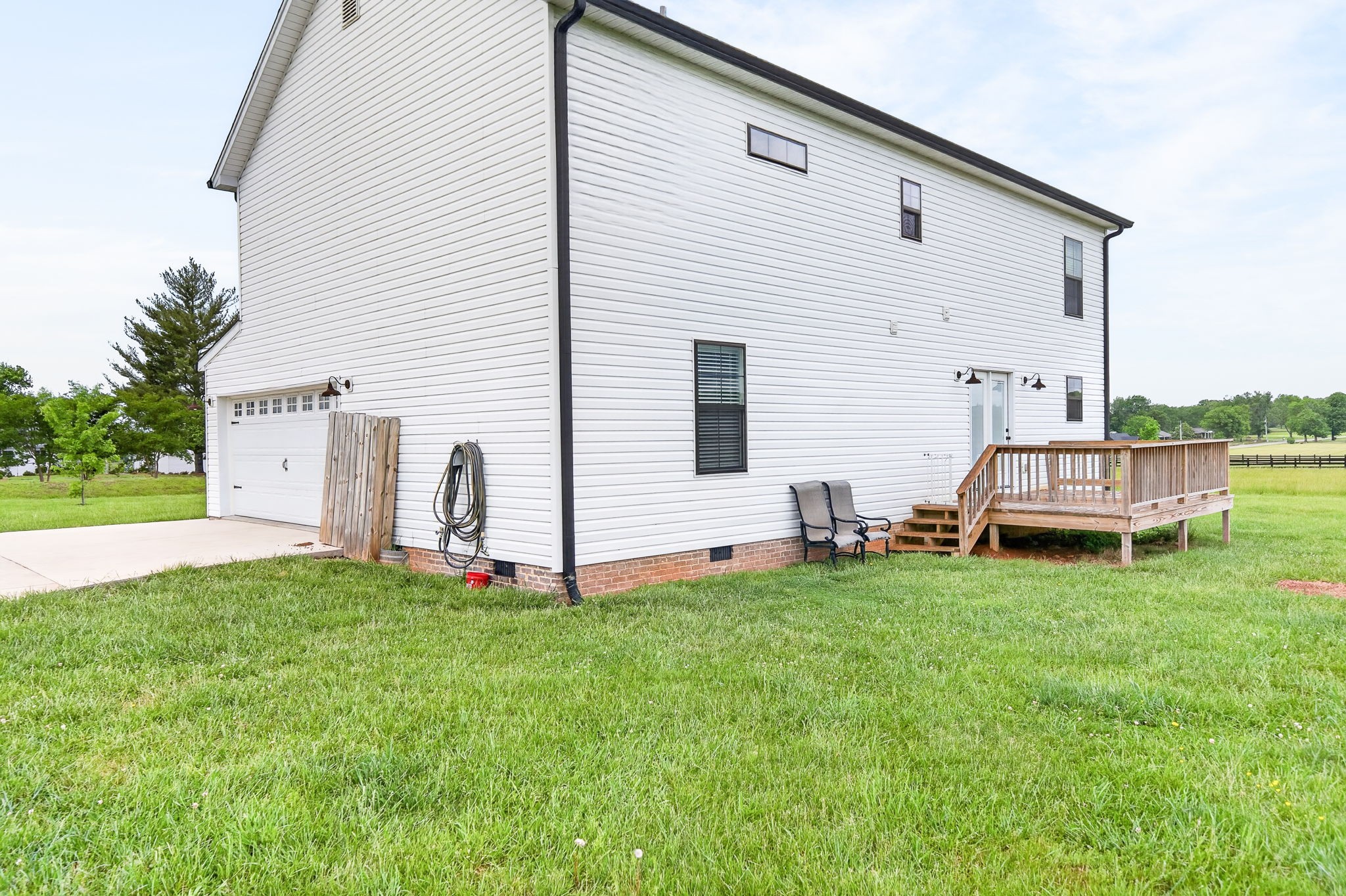 6810 Cherry Creek Road Cookeville, TN 38506 - Photo 23 of 35 a view of a house with a yard and deck