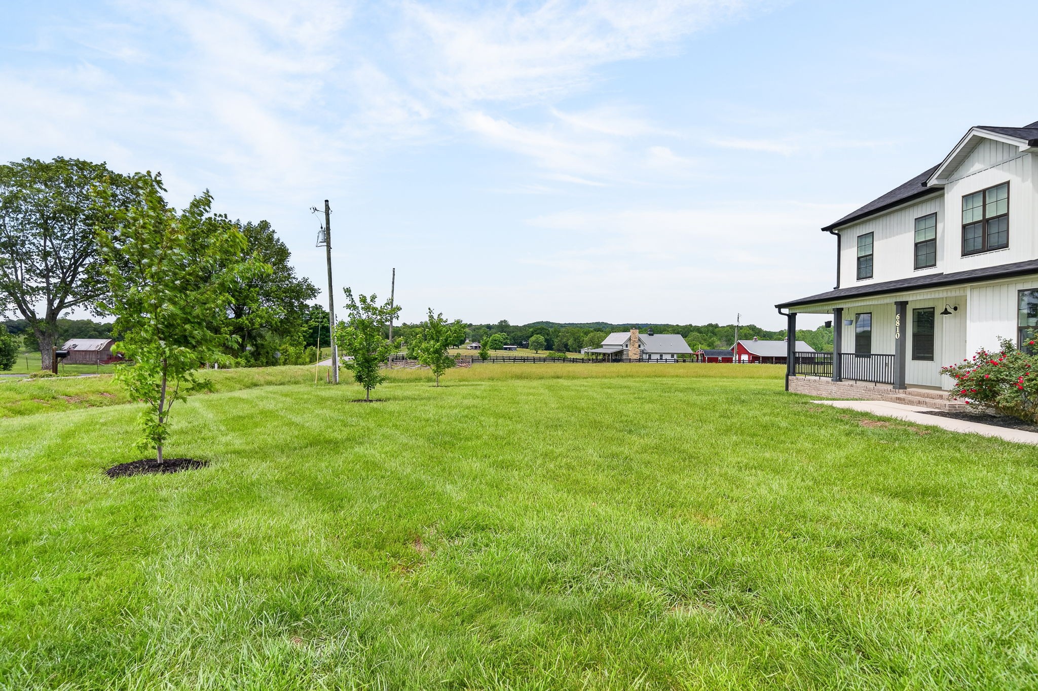 6810 Cherry Creek Road Cookeville, TN 38506 - Photo 25 of 35 a view of a garden with a house