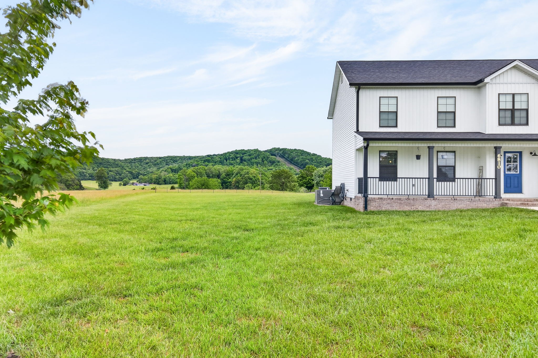 6810 Cherry Creek Road Cookeville, TN 38506 - Photo 27 of 35 a view of a house with a backyard
