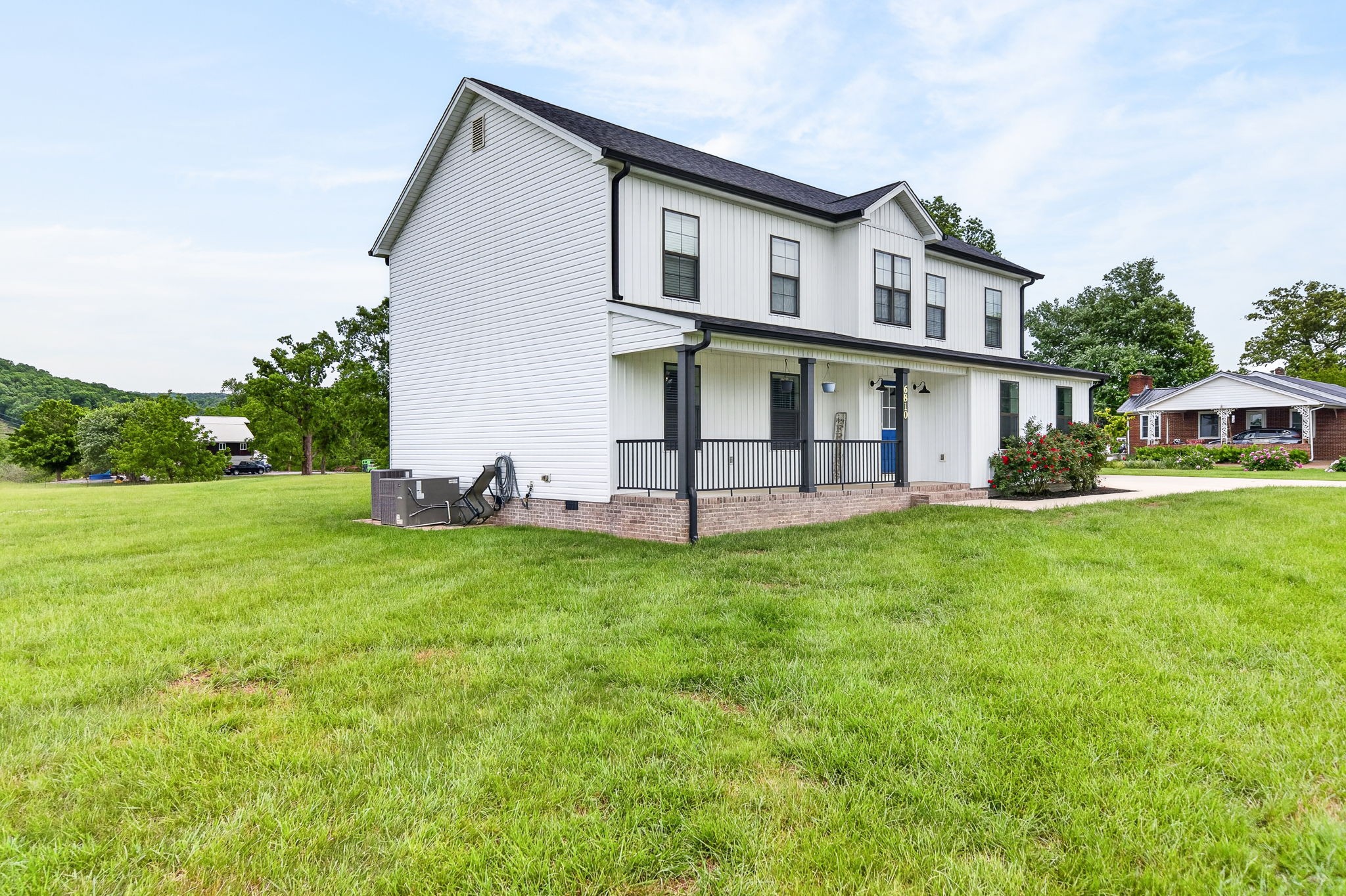 6810 Cherry Creek Road Cookeville, TN 38506 - Photo 28 of 35 a view of a house with a yard and sitting area