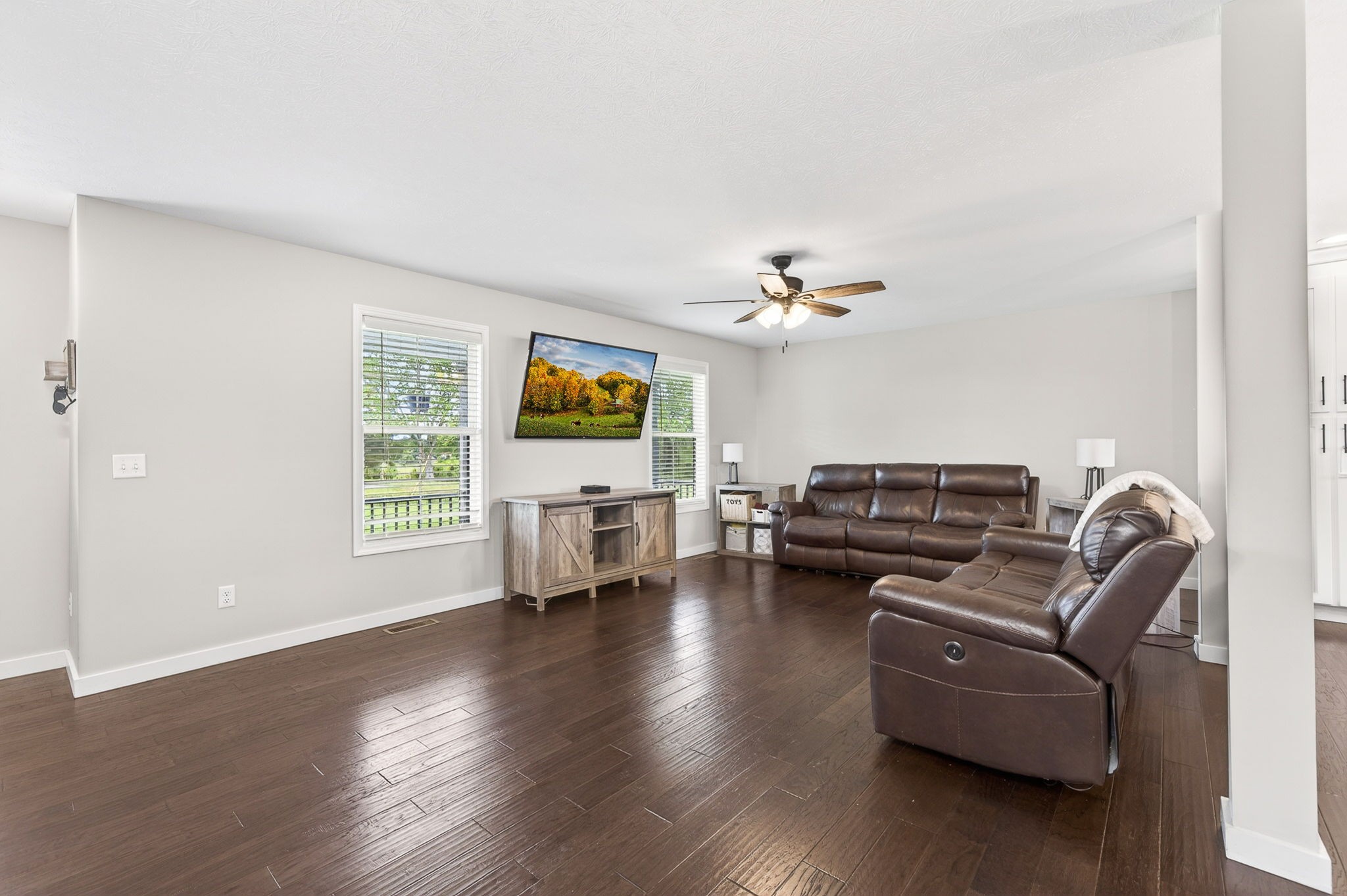 6810 Cherry Creek Road Cookeville, TN 38506 - Photo 3 of 35 a living room with furniture and a flat screen tv