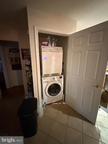 a room with furniture and a window