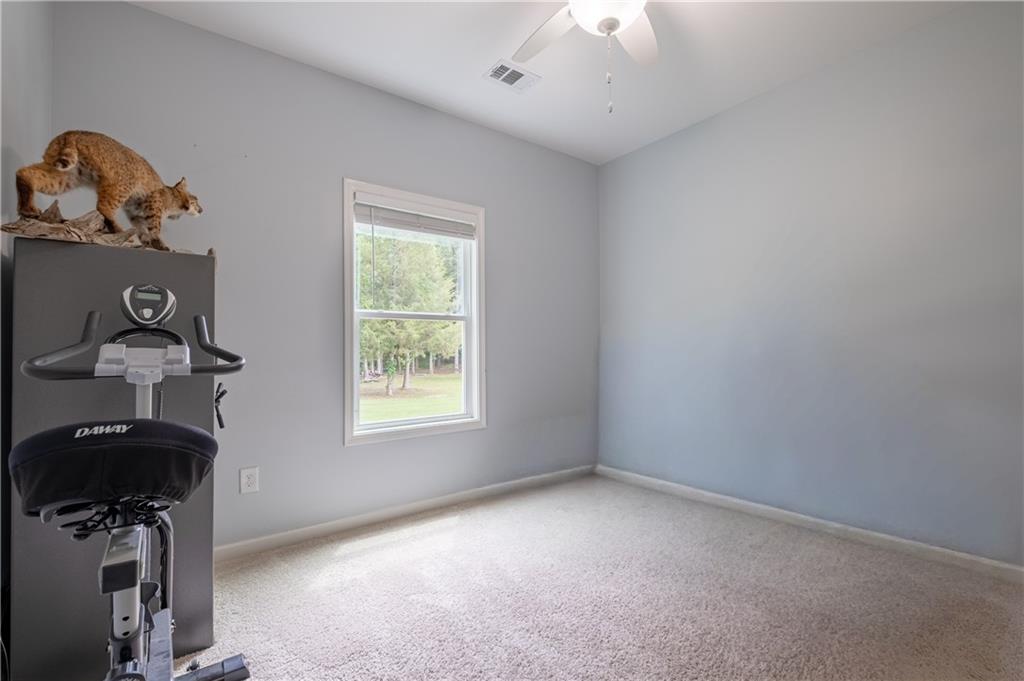 719 Fairview Road Brooks, GA 30205 - Photo 18 of 35 a view of a workspace with a window